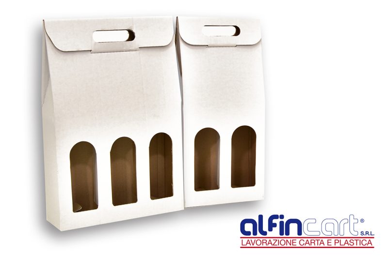 Wine Bottle Carriers manufactured from white recyclable cardboard.
