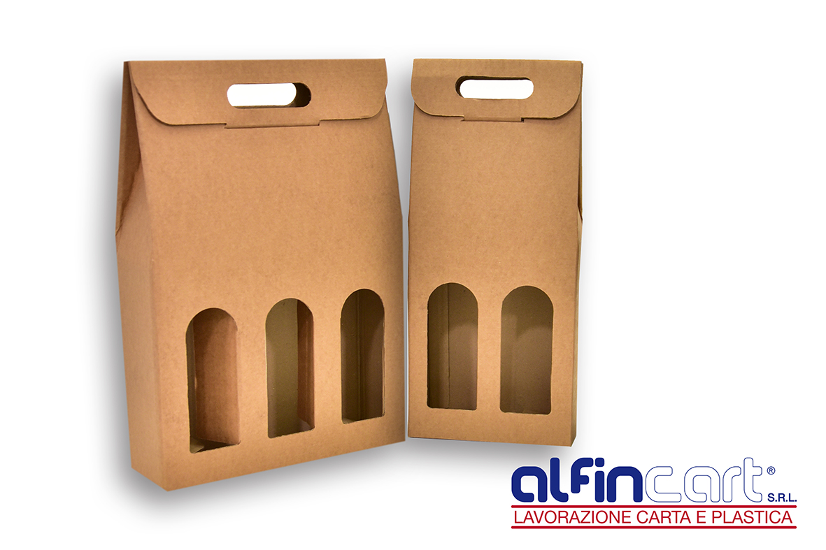 Wine Bottle Carriers manufactured from brown recyclable cardboard.